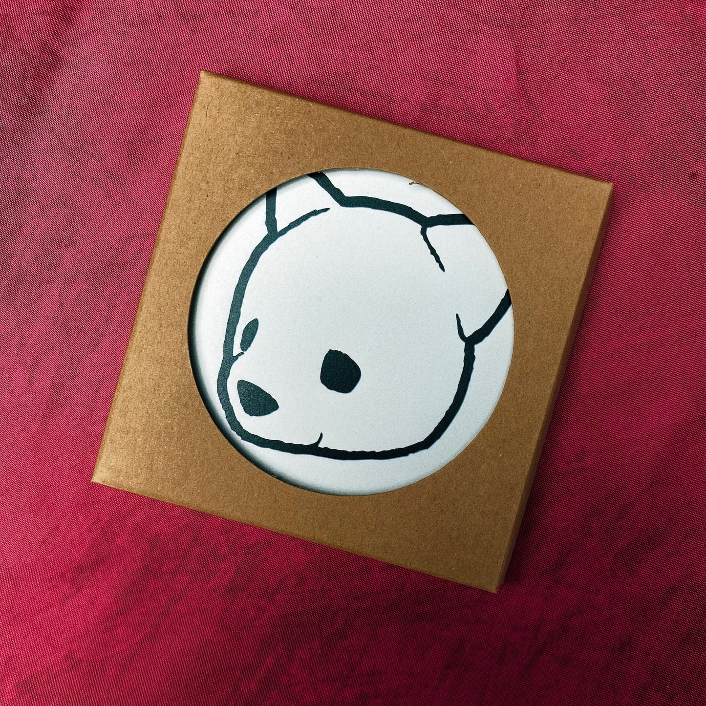 Ceramic coaster featuring Luke Chueh's bear head in its packaging. Limited-edition of 100 published by Plush Art Club.