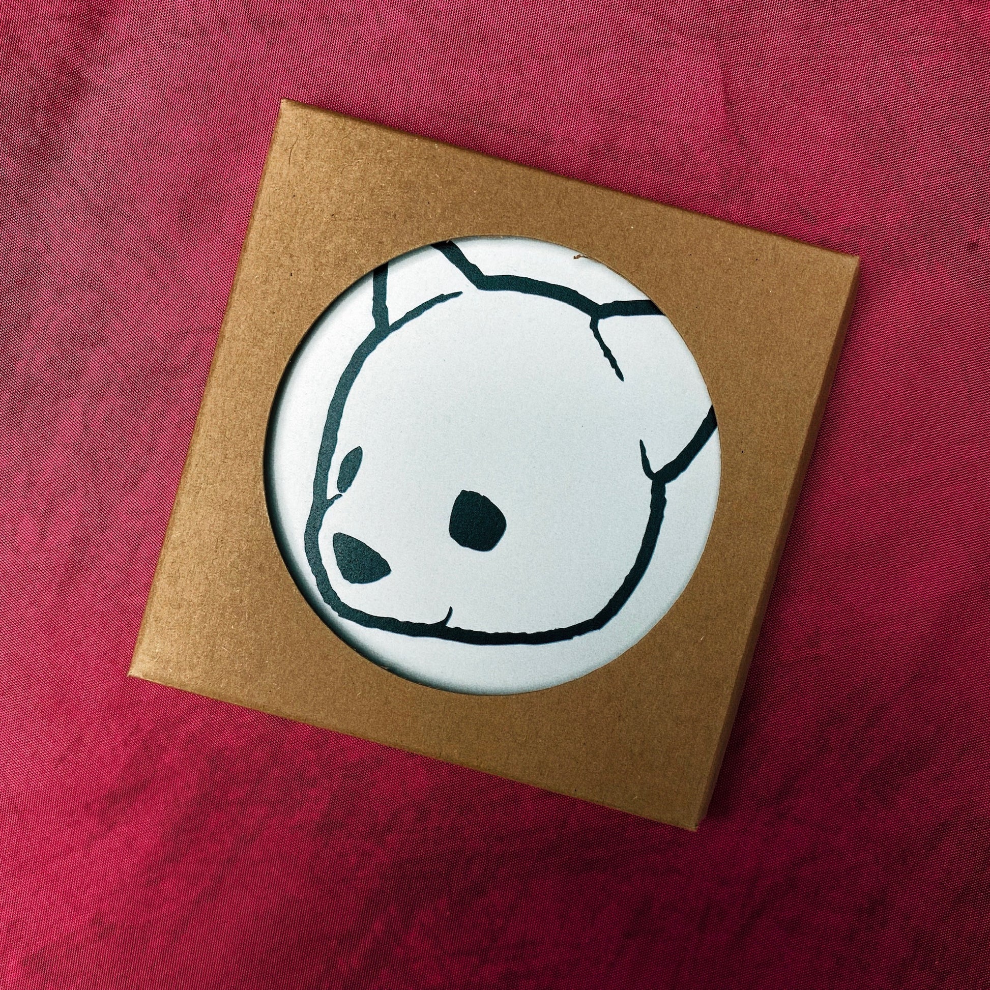 Ceramic coaster featuring Luke Chueh's bear head in its packaging. Limited-edition of 100 published by Plush Art Club.