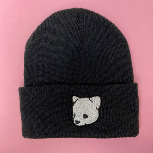 Black beanie featuring Luke Chueh's bear head. Published by Plush Art Club.