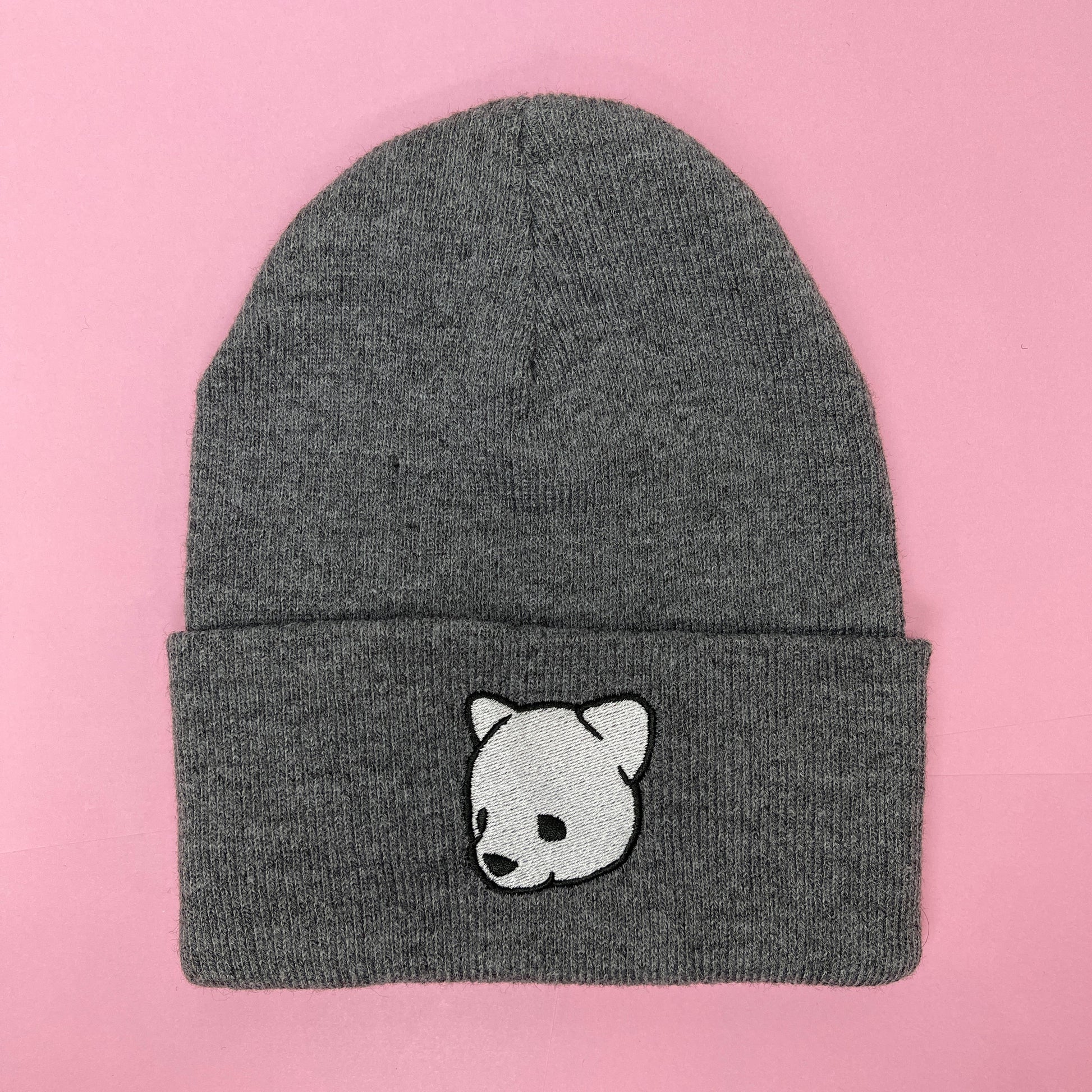 Gray beanie featuring Luke Chueh's bear head. Published by Plush Art Club.