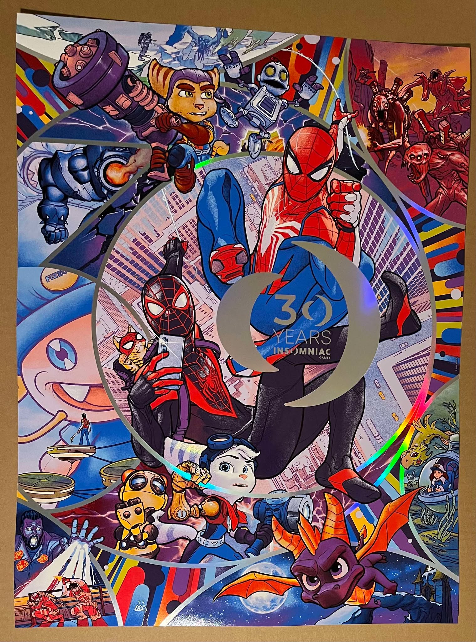 Insomniac Games 30th Anniversary 13 color silkscreen printed poster with artwork by Martin Ansin and published by Plush Art Club. It features various games develo sped by Insomniac Games: Marvel's Spider-Man, Spyro the Dragon, Resistance, Song of the Deep, Fuse / Overstrike, Ratchet and Clank, Edge of Nowhere, Sunset Overdrive, and Disruptor. Characters features are Peter Parker, Miles Morales, Fizzie, Ratchet, Clank, Rivet, Kit, Spyro, Merryn, Chimeras, among others. It is officially-licensed.  