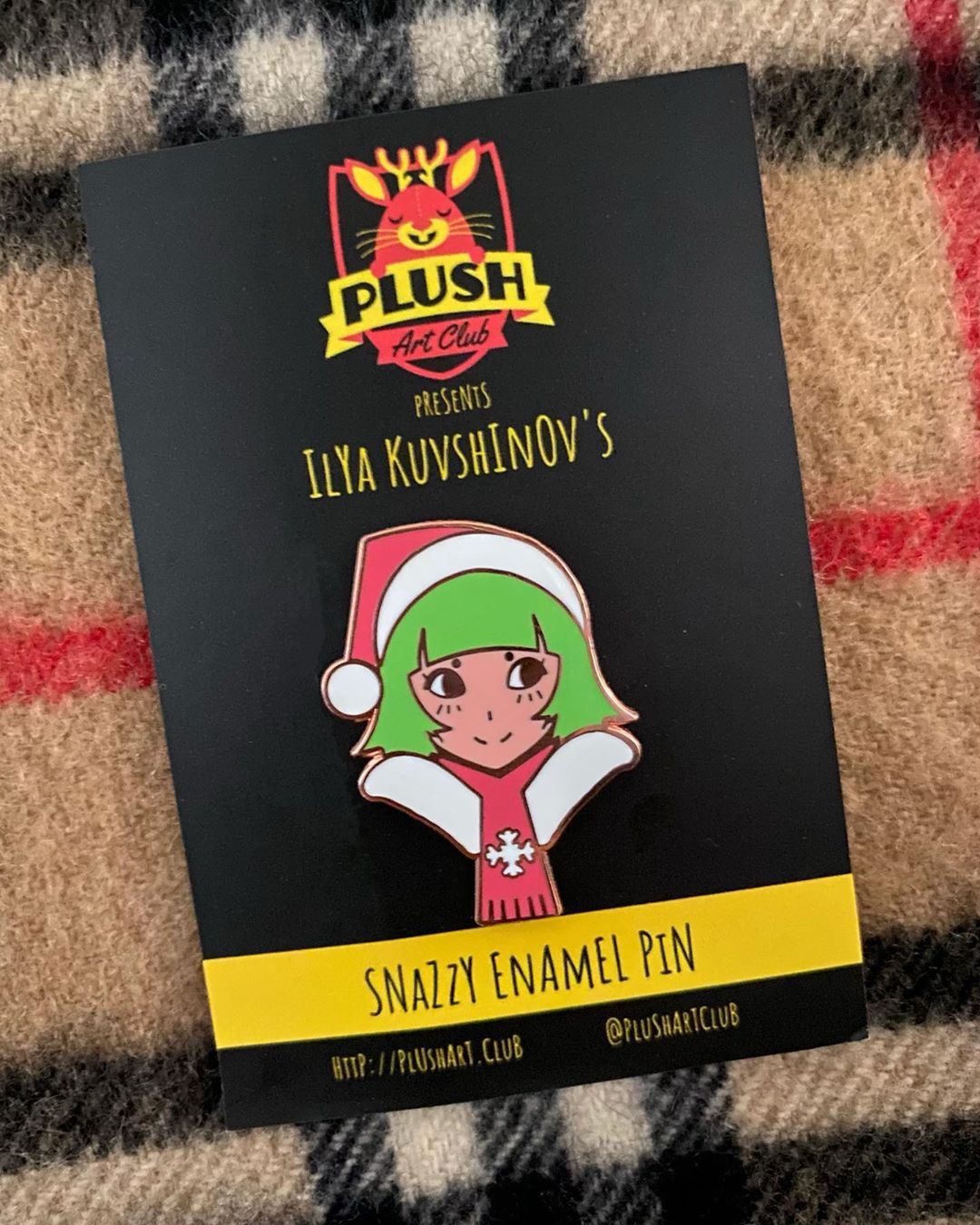 Limited-edition holiday enamel pin by Ilya Kuvshinov. Published by Plush Art Club