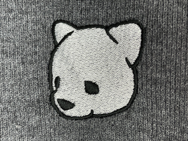 Gray beanie featuring Luke Chueh's bear head. Published by Plush Art Club.