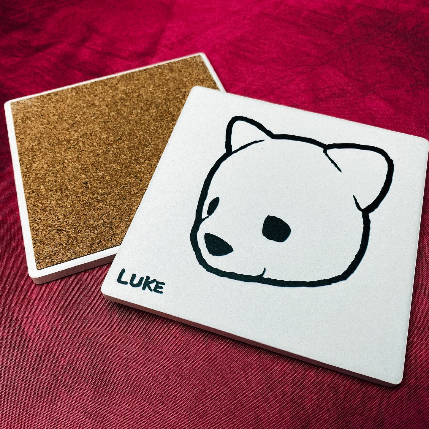 Ceramic coaster featuring Luke Chueh's bear head. Limited-edition of 100 published by Plush Art Club. Has a cork backing,