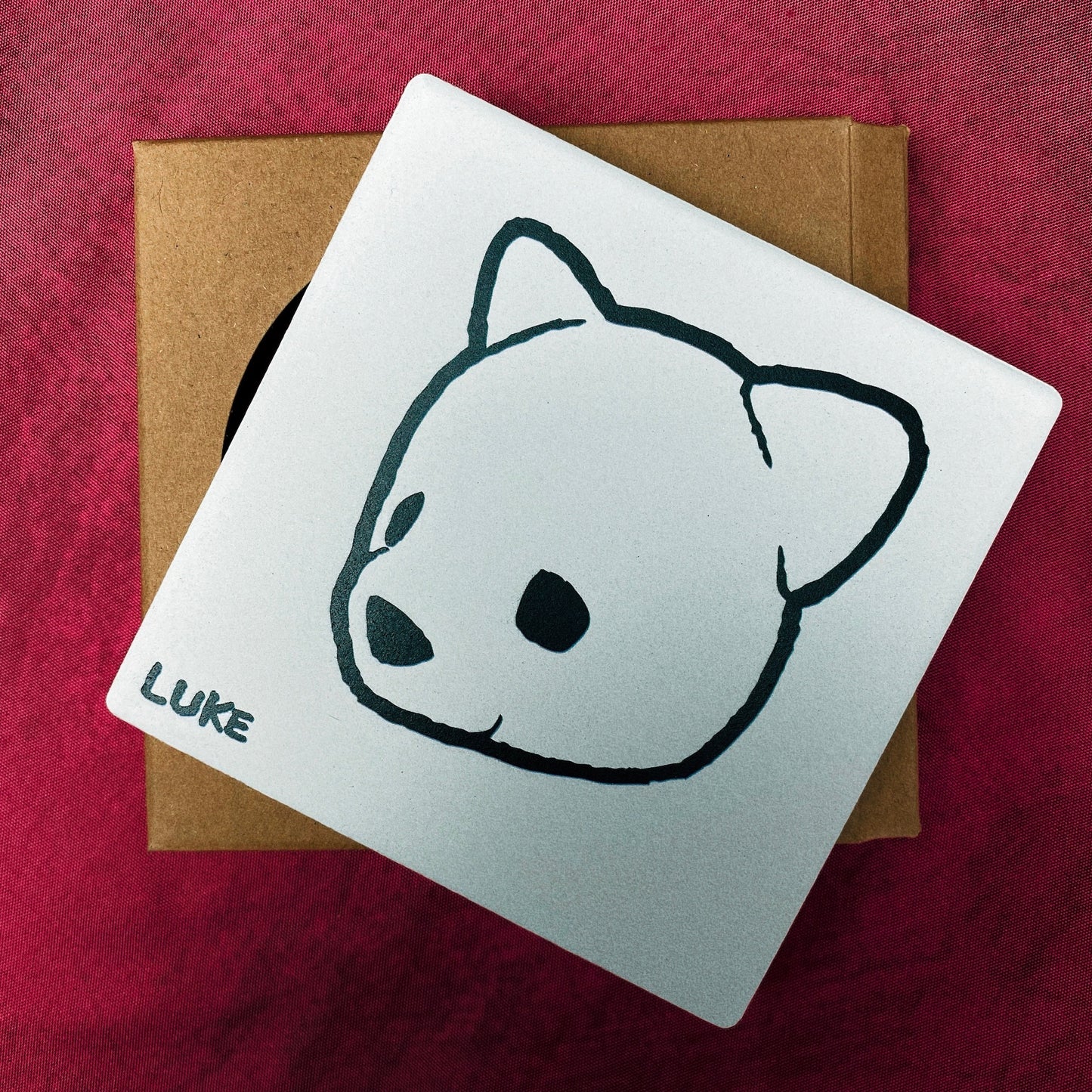 Ceramic coaster featuring Luke Chueh's bear head. Limited-edition of 100 published by Plush Art Club.
